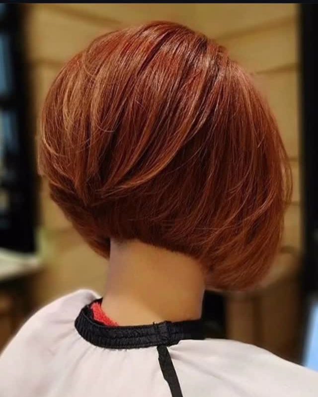Precision bob haircut in rich red color