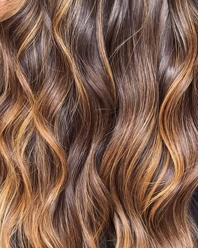Honey-blonde waves, close-up